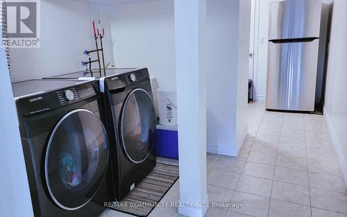 #Bsmt -218 Aspenwood Dr, Newmarket, ON - Indoor Photo Showing Laundry Room