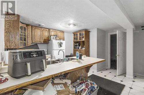 105-107 Pozzebon Cres, Sault Ste. Marie, ON - Indoor Photo Showing Kitchen With Double Sink