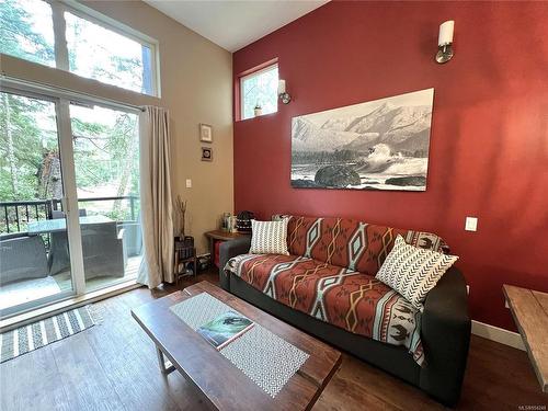 12-203 Boardwalk Blvd, Ucluelet, BC - Indoor Photo Showing Living Room With Fireplace