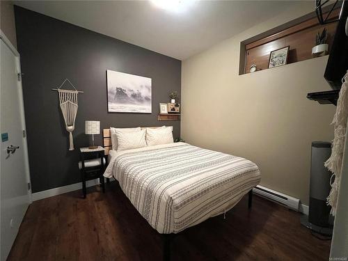 12-203 Boardwalk Blvd, Ucluelet, BC - Indoor Photo Showing Living Room With Fireplace