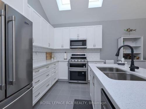 63 Summerhill Dr, New Tecumseth, ON - Indoor Photo Showing Kitchen With Stainless Steel Kitchen With Double Sink