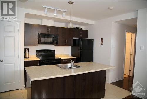 334 Everest Private Unit#A, Ottawa, ON - Indoor Photo Showing Kitchen With Double Sink