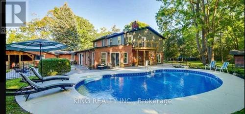 7895 Creditview Road, Brampton, ON - Outdoor With In Ground Pool With Backyard