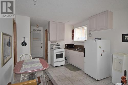 13 6Th Street, Emma Lake, SK - Indoor Photo Showing Kitchen With Double Sink