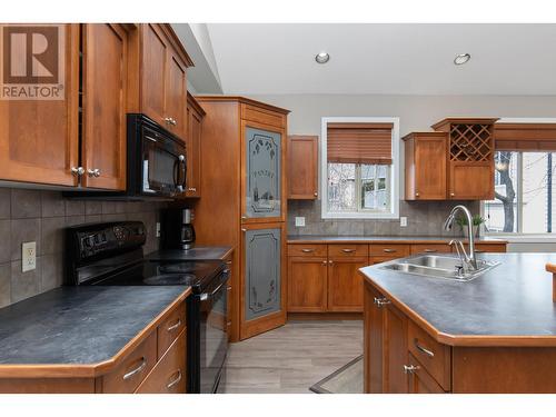 1566 Large Avenue, Kelowna, BC - Indoor Photo Showing Kitchen With Double Sink