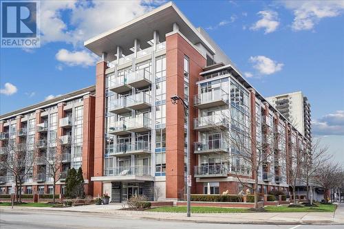 208 - 80 Port Street E, Mississauga, ON - Outdoor With Facade