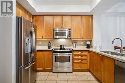 208 - 80 Port Street E, Mississauga, ON - Indoor Photo Showing Kitchen With Double Sink
