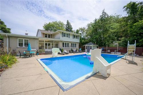 20ft x 40 ft in ground gas heated pool and electric hot tub in north side yard - 424 Mountain Brow Boulevard, Hamilton, ON - Outdoor With In Ground Pool With Backyard