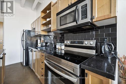 #232 -404 King St W, Kitchener, ON - Indoor Photo Showing Kitchen With Upgraded Kitchen