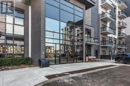 #220 -102 Grovewood Common Cres, Oakville, ON - Outdoor With Facade