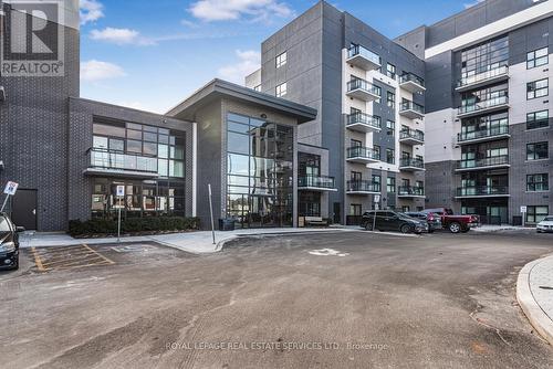 #220 -102 Grovewood Common Cres, Oakville, ON - Outdoor With Facade