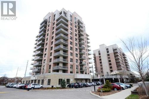 701 - 810 Scollard Court, Mississauga, ON - Outdoor With Facade