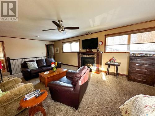 410 Oldroyd Drive, Good Spirit Lake, SK - Indoor Photo Showing Living Room With Fireplace