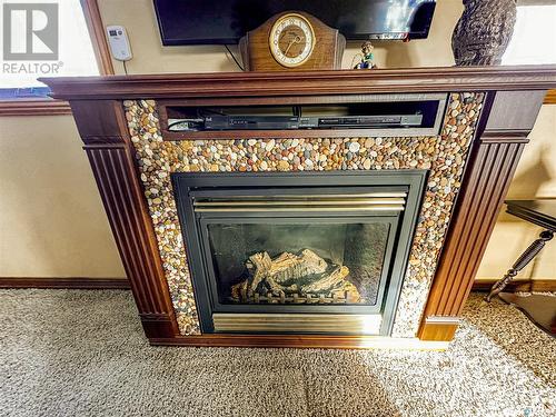 410 Oldroyd Drive, Good Spirit Lake, SK - Indoor Photo Showing Living Room With Fireplace