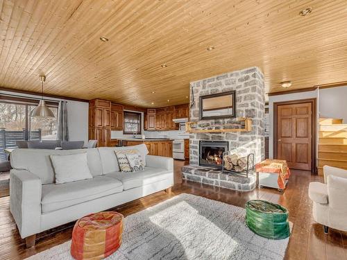 Overall view - 392 Route 138, Neuville, QC - Indoor Photo Showing Living Room With Fireplace