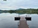 565 Ch. Du Refuge, Lac-Supérieur, QC  - Outdoor With Body Of Water With View 