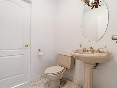 Powder room - 207 Rue Sidney-Cunningham, Beaconsfield, QC - Indoor Photo Showing Bathroom