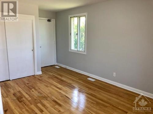 Unit 1 Bedroom with hardood floors - 1299 Dorchester Avenue, Ottawa, ON - Indoor Photo Showing Other Room