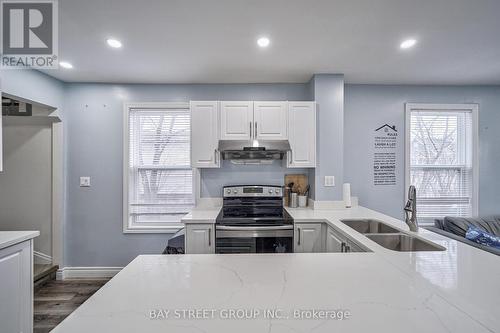 5241 Kitchener Street, Niagara Falls, ON - Indoor Photo Showing Kitchen With Double Sink