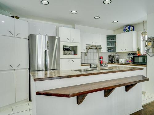 Cuisine - 1229 Ch. Des Quatorze-Îles, Prévost, QC - Indoor Photo Showing Kitchen With Double Sink