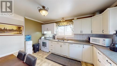 209 Henry Street, Moosomin, SK - Indoor Photo Showing Kitchen With Double Sink