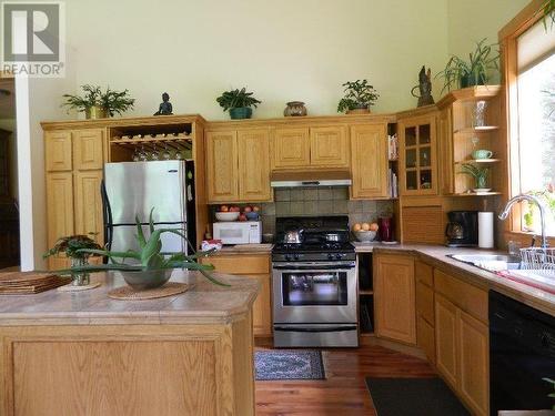 2540 Saloompt Road, Bella Coola, BC - Indoor Photo Showing Kitchen With Double Sink