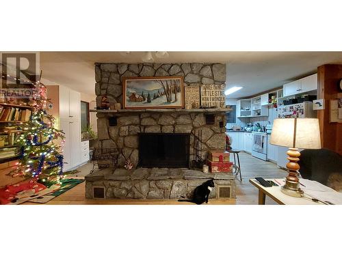 2492 S Douglas Drive, Bella Coola, BC - Indoor Photo Showing Living Room With Fireplace