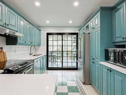 Kitchen - 12184 Av. Colbert, Montréal (Ahuntsic-Cartierville), QC - Indoor Photo Showing Kitchen With Upgraded Kitchen