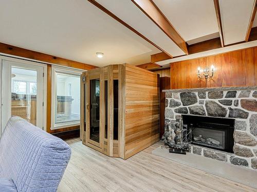 Sauna - 12184 Av. Colbert, Montréal (Ahuntsic-Cartierville), QC - Indoor Photo Showing Living Room With Fireplace