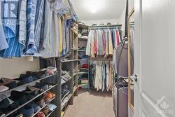 Primary suite's walk-in closet - 