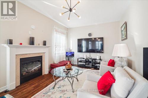 26 Clearfield Dr N, Brampton, ON - Indoor Photo Showing Living Room With Fireplace