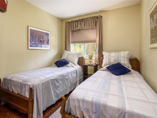 4085 Carey Pl, Royston, BC - Indoor Photo Showing Bedroom