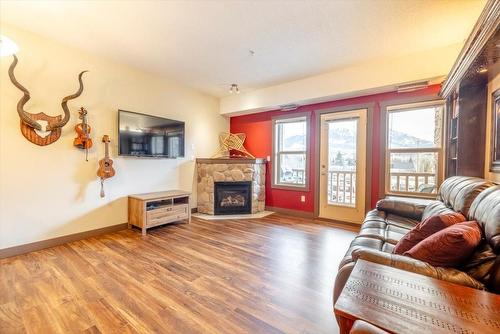 201 - 1500 Mcdonald Avenue, Fernie, BC - Indoor Photo Showing Living Room With Fireplace