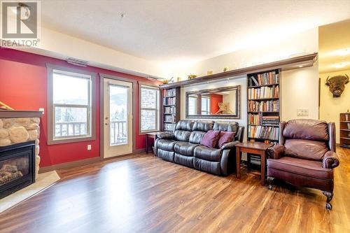 1500 Mcdonald Avenue Unit# 201, Fernie, BC - Indoor Photo Showing Living Room With Fireplace