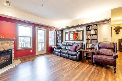 201 - 1500 Mcdonald Avenue, Fernie, BC - Indoor Photo Showing Living Room With Fireplace