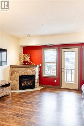 1500 Mcdonald Avenue Unit# 201, Fernie, BC - Indoor Photo Showing Living Room With Fireplace