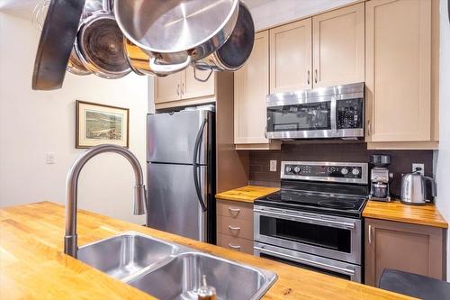 201 - 1500 Mcdonald Avenue, Fernie, BC - Indoor Photo Showing Kitchen With Stainless Steel Kitchen With Double Sink