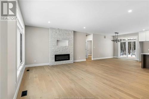 168 Joviale Dr, Irishtown, NB - Indoor Photo Showing Living Room With Fireplace
