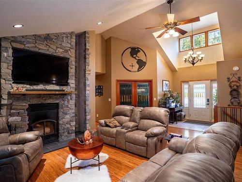 3297 Back Road Road, Revelstoke, BC - Indoor Photo Showing Living Room With Fireplace