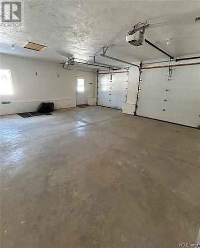 148 Taurus Lane, Hanwell, NB - Indoor Photo Showing Garage