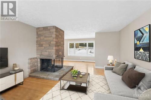 Virtually staged - 5466 North Drive, Ottawa, ON - Indoor Photo Showing Living Room With Fireplace