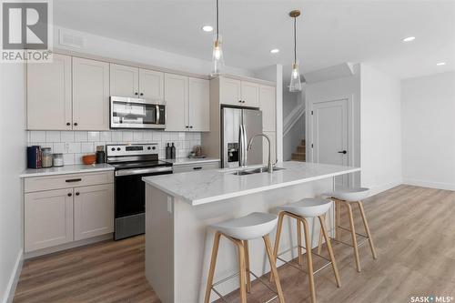 240 Dziadyk Manor, Saskatoon, SK - Indoor Photo Showing Kitchen With Stainless Steel Kitchen With Double Sink With Upgraded Kitchen