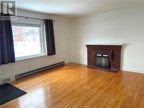 45 Leslie St, Moncton, NB - Indoor Photo Showing Living Room With Fireplace