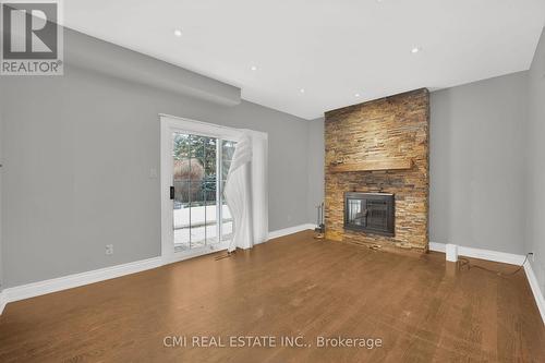 13 Axminster Rd, Brampton, ON - Indoor Photo Showing Living Room With Fireplace