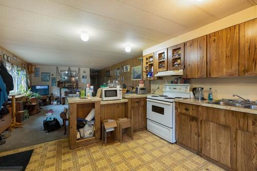649 Lee Road Unit# 1,2,3, Tappen, BC - Indoor Photo Showing Kitchen With Double Sink