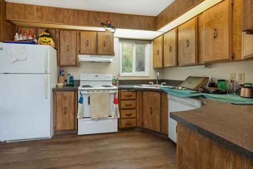 649 Lee Road Unit# 1,2,3, Tappen, BC - Indoor Photo Showing Kitchen With Double Sink