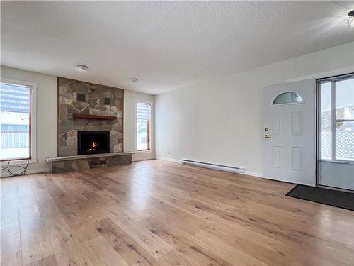 362 Ashburton Street, Virden, MB - Indoor Photo Showing Living Room With Fireplace