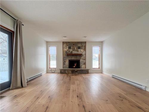 362 Ashburton Street, Virden, MB - Indoor Photo Showing Living Room With Fireplace