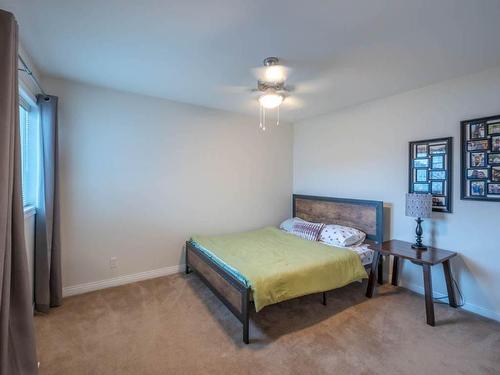 7-148 Roy Avenue, Penticton, BC - Indoor Photo Showing Bedroom