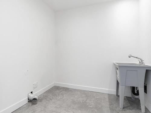 Laundry room - 245 Rue Hauterive, Laval (Duvernay), QC - Indoor Photo Showing Other Room
